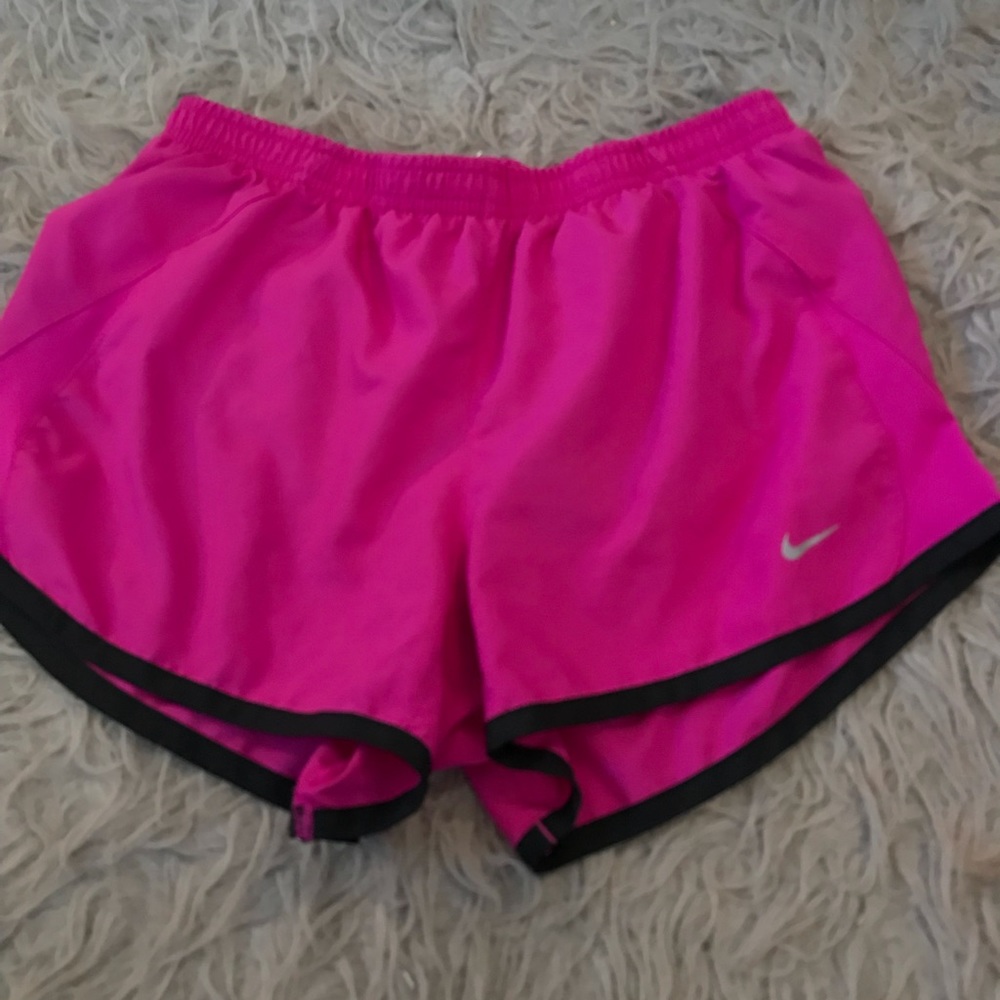 Pink Nike running shorts